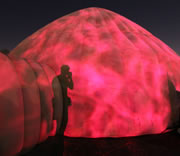 Contact Brian Biery, shown photographing the summer arts festival in Gerlach, Nevada